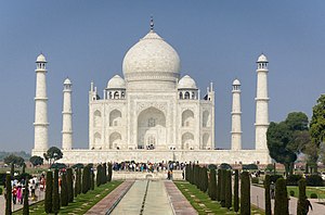 Taj Mahal, a domed building in white marble with four surrounding minarets