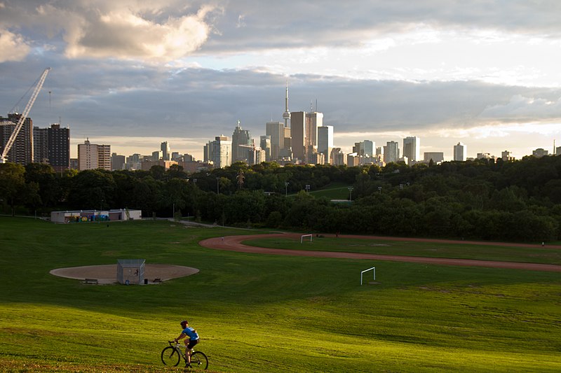 File:Toronto cyclist and skyline September 2010.jpg