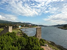 The Torres de Oeste were built circa 1020 to protect the seaways into Santiago de Compostela, Galicia Torres de Oeste.jpg