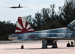 VFC-111 F-5N at NAS Key West with a USAF U-2S landing in the background, 2008 U-2S and F-5F VFC-111 at NAS Key West 2008.jpg