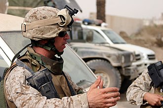 AR RAMADI, Iraq (November 5, 2005) - Major Dan Wagner, team chief for Team 4, 6th Civil Affairs Group, speaks with his Marines before embarking on a patrol through the streets of Ar Ramadi Nov. 5. Photo by Cpl. Shane Suzuki USMC-051105-M-8489S-008.jpg