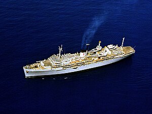 USS Hunley (AS-31) off Agana Bay, Guam, on 1 August 1980 (6451565).jpg