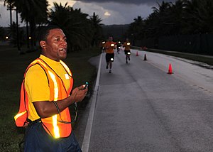 US Navy 120127-N-UE250-066 Machinist's Mate 2nd Class Thaddeus Malbreaux, assigned to the submarine tender USS Emory S. Land (AS 39), shouts out th.jpg