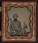 Unidentified soldier of Co. H, 13th Virginia Infantry Regiment in uniform with over the shoulder saxhorn