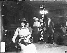 A 1912 portrait of Frankie Fore, sitting in a room during a vice raid in Calumet City (formerly known as West Hammond), Illinois. Vice squad interrogation in Calumet City 1912 ichicdn n059451.jpg