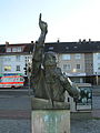 Statue in Bremen, germany, in at the wartbug stop. with another five statues, the six form a circle.