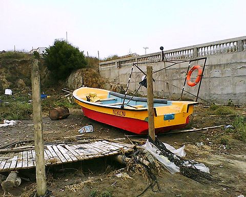 Boat after tsunami in Pichilemu.
