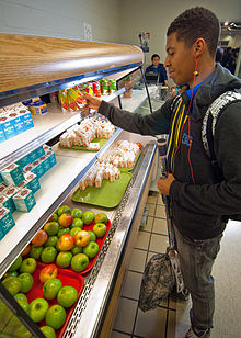 A student at a public school in Virginia selects fruit juice for breakfast 20111019-FNS-RBN-1590 - Flickr - USDAgov.jpg