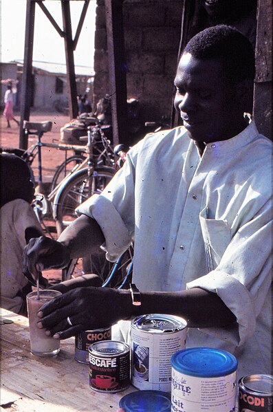 File:ASC Leiden - W.E.A. van Beek Collection - Dogon markets 05 - Coffee bar keeper, Sangha market, Mali 1992.jpg