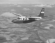 Aero Commander L-26C in flight