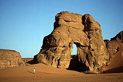 The famous arch on Route L3, KM96 in the Acacus Mountains. AkakarchChrisScott.jpg