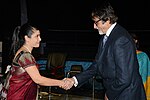 Thumbnail for File:Amitabh Bachchan Piya Sorcar Handshake.jpg