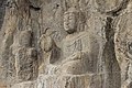 Ancient Buddhist Grottoes at Longmen- Three Buddhas on the Cliff, Seated Buddha on the Southern Side.jpg