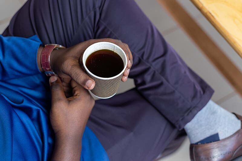 File:Another gentleman enjoying coffee.jpg