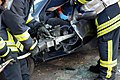 * Nomination: Firefighters opening a car --Mbdortmund 19:54, 15 October 2008 (UTC) * * Review needed