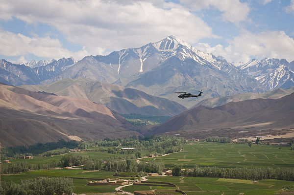 Image: Black Hawk flying over a valley in Bamyan