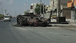 Destroyed SAA tank in the city in October 2012 Blown out tank Aleppo.jpg