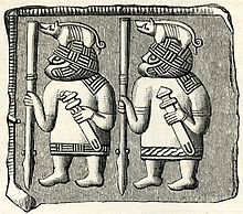 Placa de bronze representando dois homens idênticos