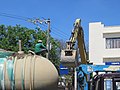 Bulakenyo drivers crew Tadano Caterpillar excavator cleaning green fuel tank 03