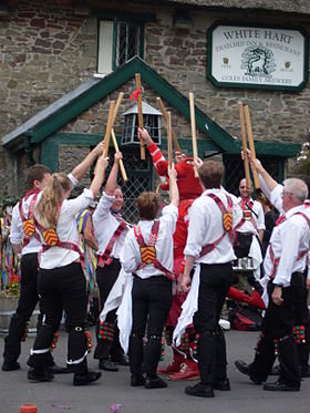 Cardiff Morris in Carmarthen finish a Nantgarw stick dance in distinctive style, by surrounding the mascot, Idris.