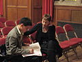 Caroline Lucas being interviewed Oxford Town Hall.JPG