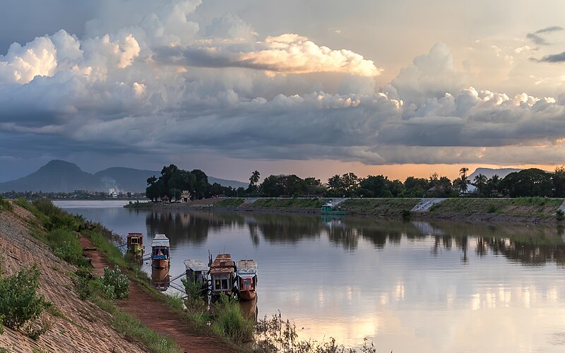 File:Clouds over the Xe Don River with boats at sunset in Pakse Laos.jpg