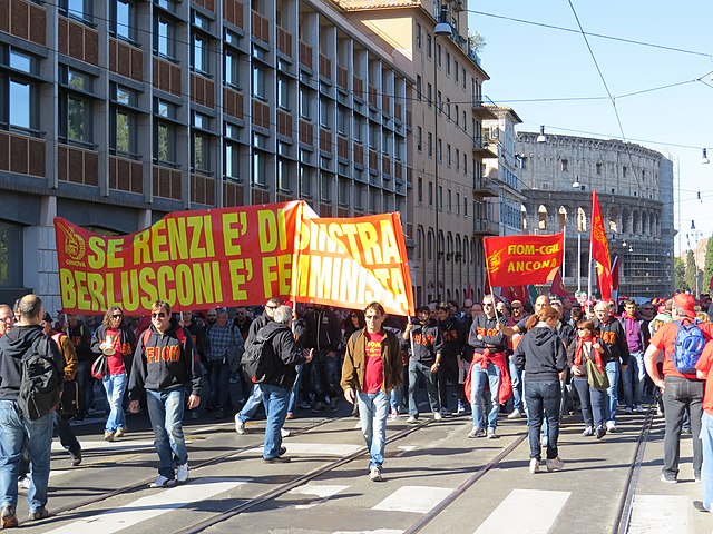 Trade union protesters demonstrate near the Colosseum against Renzi's labour market reforms