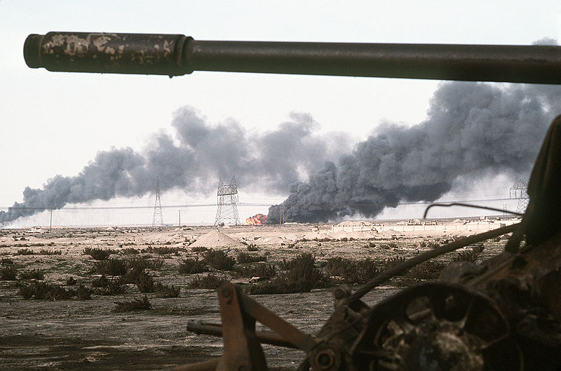 File:Disabled Iraqi T-54A, T-55, Type 59 or Type 69 tank and burning Kuwaiti oil field.jpg