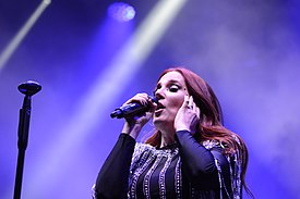 Simons in 2022 during a concert with Epica.