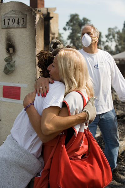 File:FEMA - 33423 - A Red Cross volunteer comforts the sister of a fire victim in California.jpg