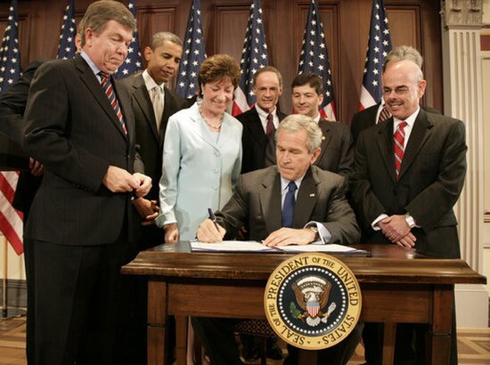 Congressman Hensarling and then Senator Barack Obama looked on President George W. Bush signs into law the Federal Funding Accountability and Transpar