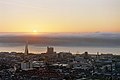 Haar approaching Dundee city centre across River Tay at Sunrise late 1998 from Law.jpg