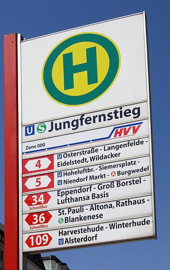 Bus stop sign in Hamburg with line numbers and major stops