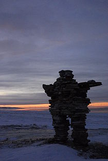 An inukshuk at sunset. Inukshuk Sunset Kuujjuaraapik January.jpg