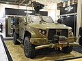 Shown at DSEi 2017, a JLTV in British Army green and fitted with UK-specific equipment.