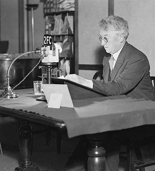 Prime Minister Joseph Lyons preparing to make a broadcast on 2FC Sydney.