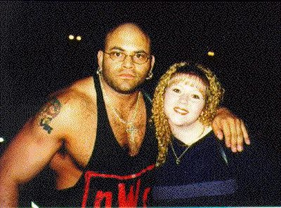 Konnan in 1998 as a member of the nWo Wolfpac with a fan