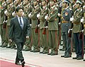 General Khin Nyunt inspecting a Vietnamese honor guard at the Presidential Palace in Hanoi, Vietnam, on 9 August 2004.