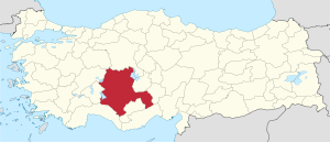 Konya highlighted in red on a beige political map of Turkeym