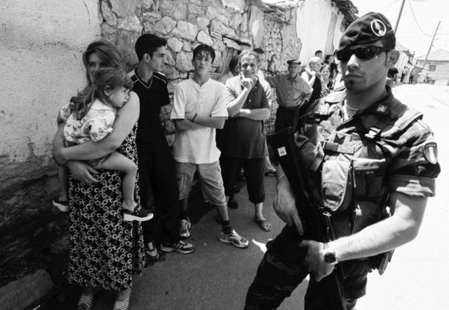 Italian Army KFOR soldier protecting Serb civilians in Orahovac during the 2004 unrest.