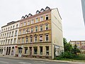 Apartment building in half-open development