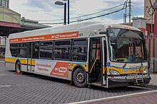 A typical New Flyer XDE40 Hybrid bus MBTA 1824 at Dudley station, December 2018.jpg