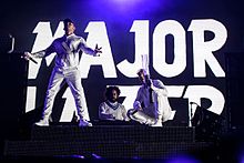 Electronic dance music trio Major Lazer and its members: Diplo, Jillionaire, and Walshy Fire Major Lazer Im Park 2016 (13 von 15).jpg