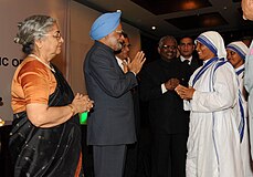 Manmohan Singh meeting the nuns from missionaries of charity at a reception for Indian community hosted by the Indian High Commissioner, in Dar es Salaam, Tanzania. Smt. Gursharan Kaur.jpg