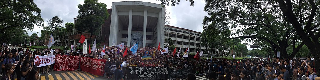 Activist organizations in UP Diliman in front of Palma Hall led a student walkout protest in 2019 commemorating the 47th anniversary of the declaration of martial law. Martial Law 47th Anniversary Mobilization Manila Philippines UP Diliman Panorama.jpg
