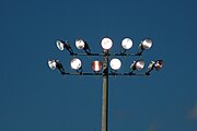 Two horizontal rows of lamps pointing toward the viewer