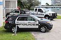 Ford Police Interceptor Utility and unknown pickup