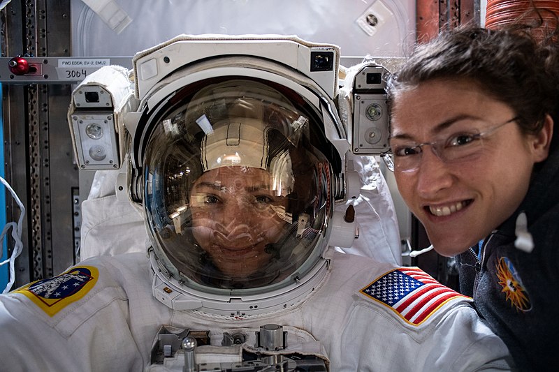 File:NASA astronauts Christina Koch and Jessica Meir prepare for a spacewalk.jpg