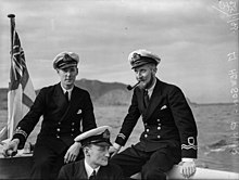 Lieutenants of the RNR (left) and RNVR (right) during the Second World War--note the difference in insignia styles. Naval Officer Who Came To the Rescue of French Family at Oran. 25 and 26 January 1943, Oran and Mers-el-kebir. Lt Ronald G Hewson, Rnvr, Was Looking in the Window of a Wireless Shop at Oran, North Africa. He Ov A14310.jpg