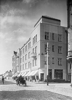 Mustavalkoinen kuva rakennuksesta vuodelta 1907